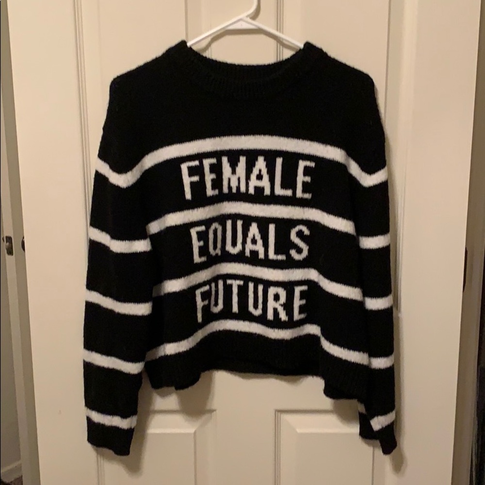 Striped sweater with phrase ‘female equals future’